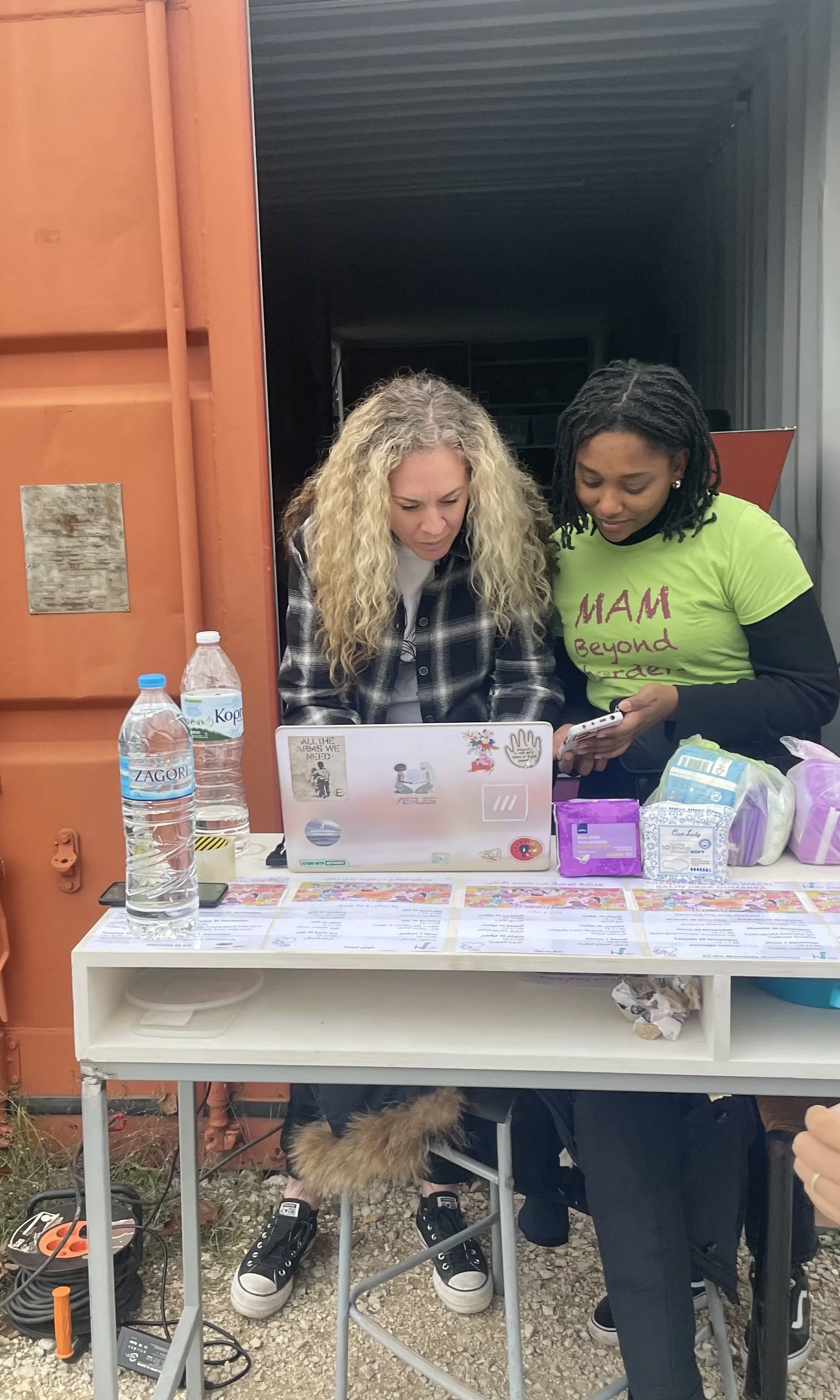  Melissa working on a pad distribution with MAM Beyond Borders, an NGO that LHI partners with to provide reproductive and sexual health seminars for women at the Female Friendly Space at the LHI Community Center in Serres. 