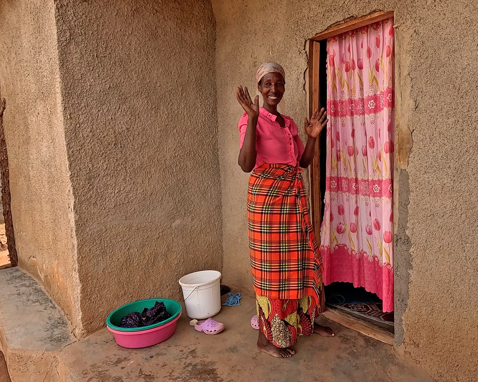  Nyabeza welcoming the LHI team to her current home in the Kyaka II refugee camp. 