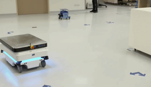 GIF showing RoMi-H moving around a hospital