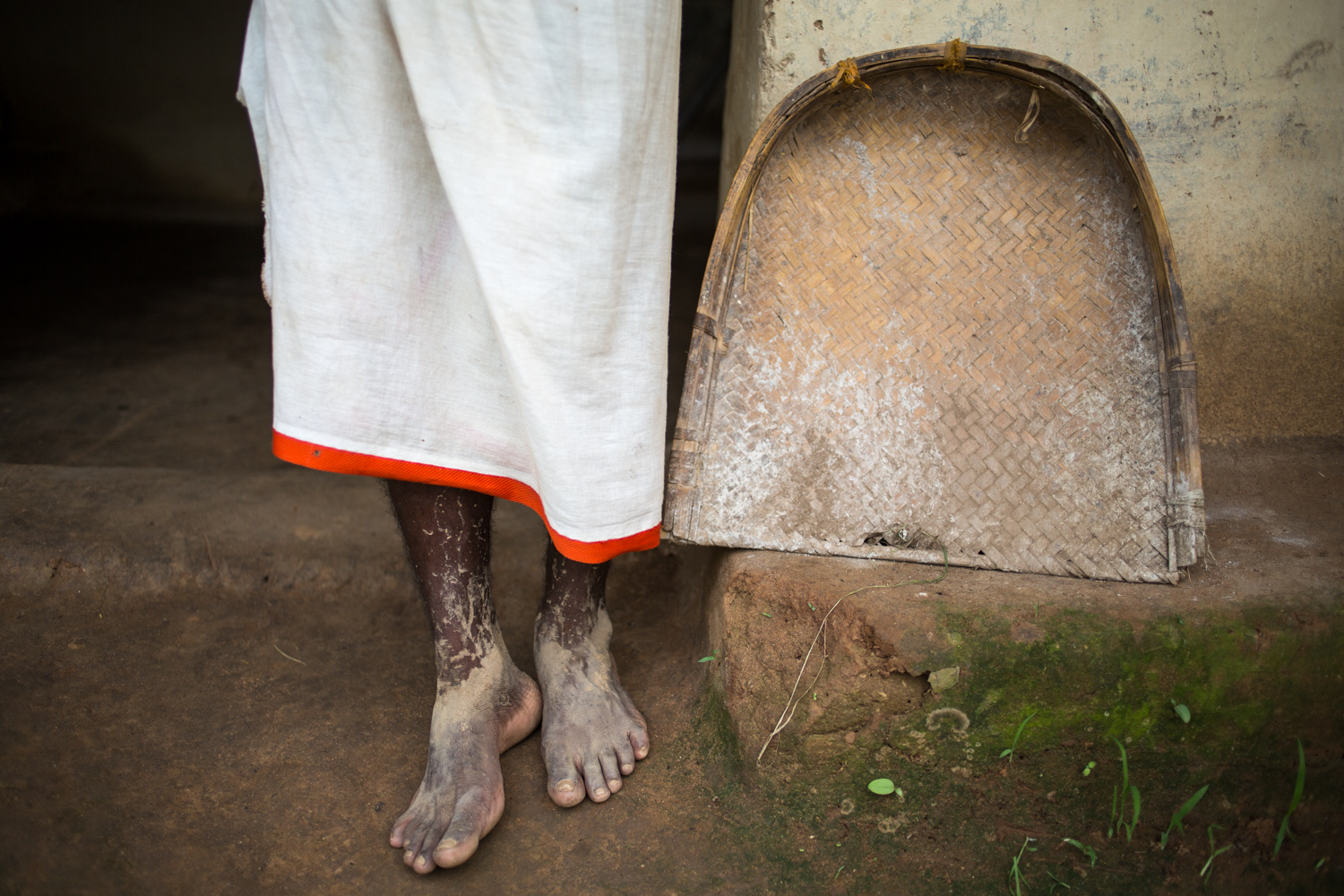 The well-oiled feet of a paddy farmer in Pedtali, a remote village in the forests of Mahan in Madhya Pradesh, INDIA. The village might disappear if coal mining is allowed in the region to feed the many thermal power plants that have cropped.