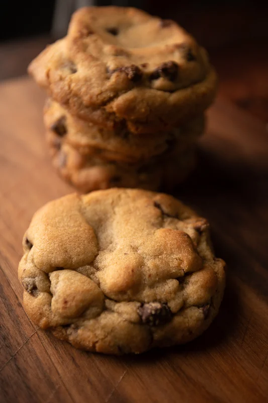 Cookies sit on a walnut board. © Robert Lowdon