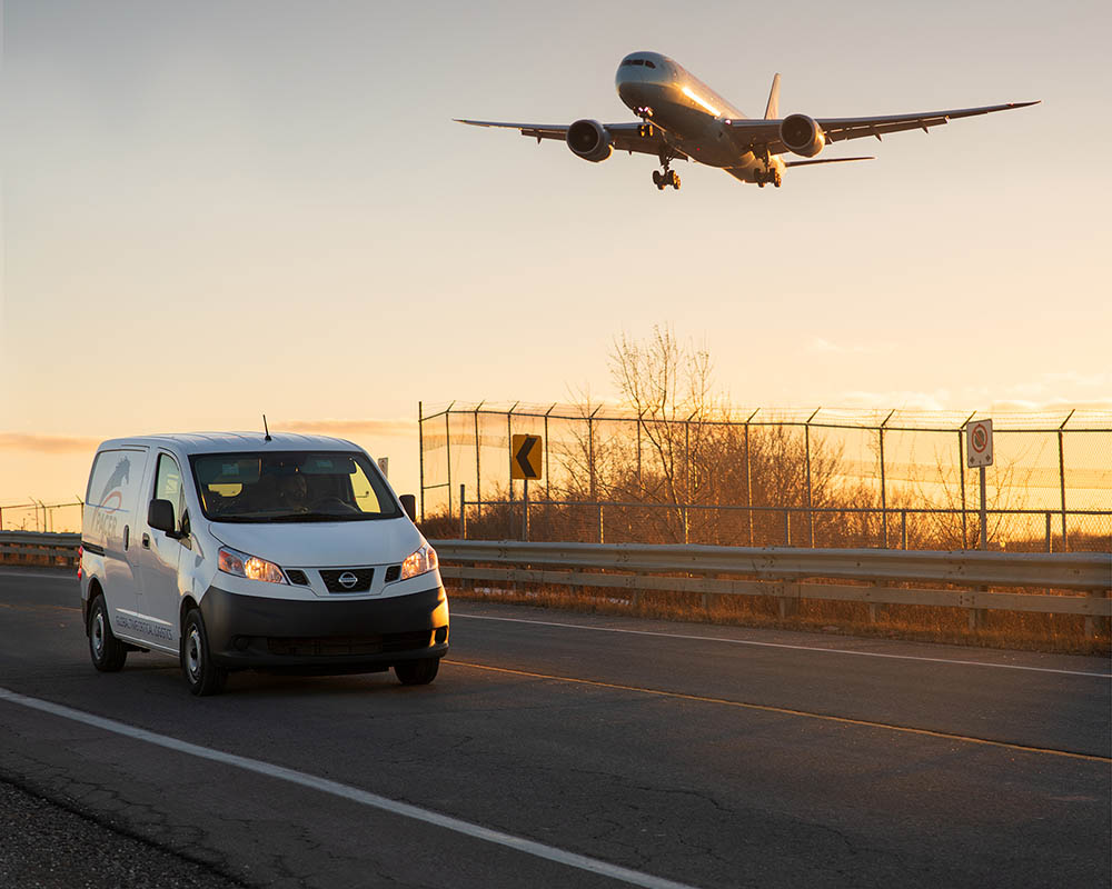 Truck With Airplane Above