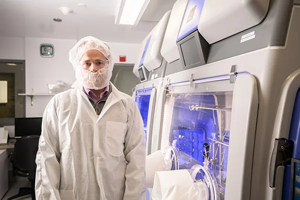 A lab technician inside a laboratory