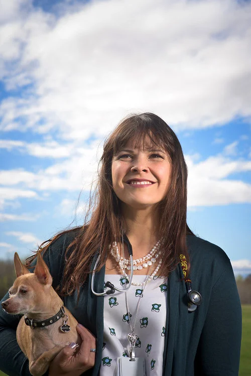 Doctor Holding Dog