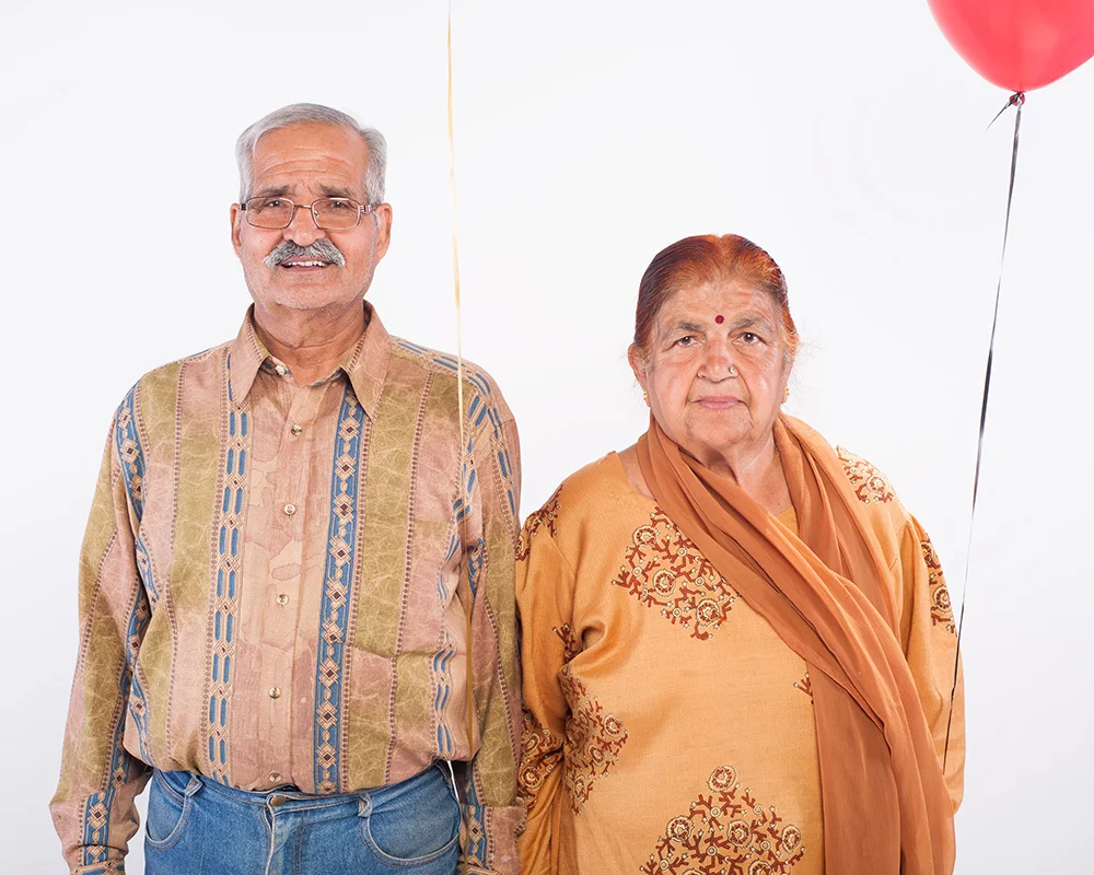 Couple Holds Balloon