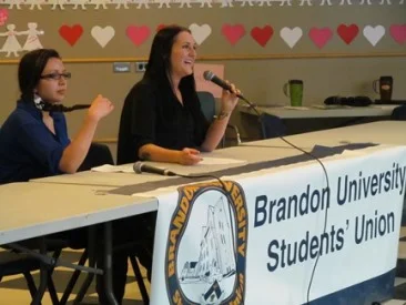 Vice President External candidates Julea Stoneman-Sinclair (left) and Jenna Clinton (right) at the BUSU debate on March 4, 2013. (Brady Knight / The Quill)