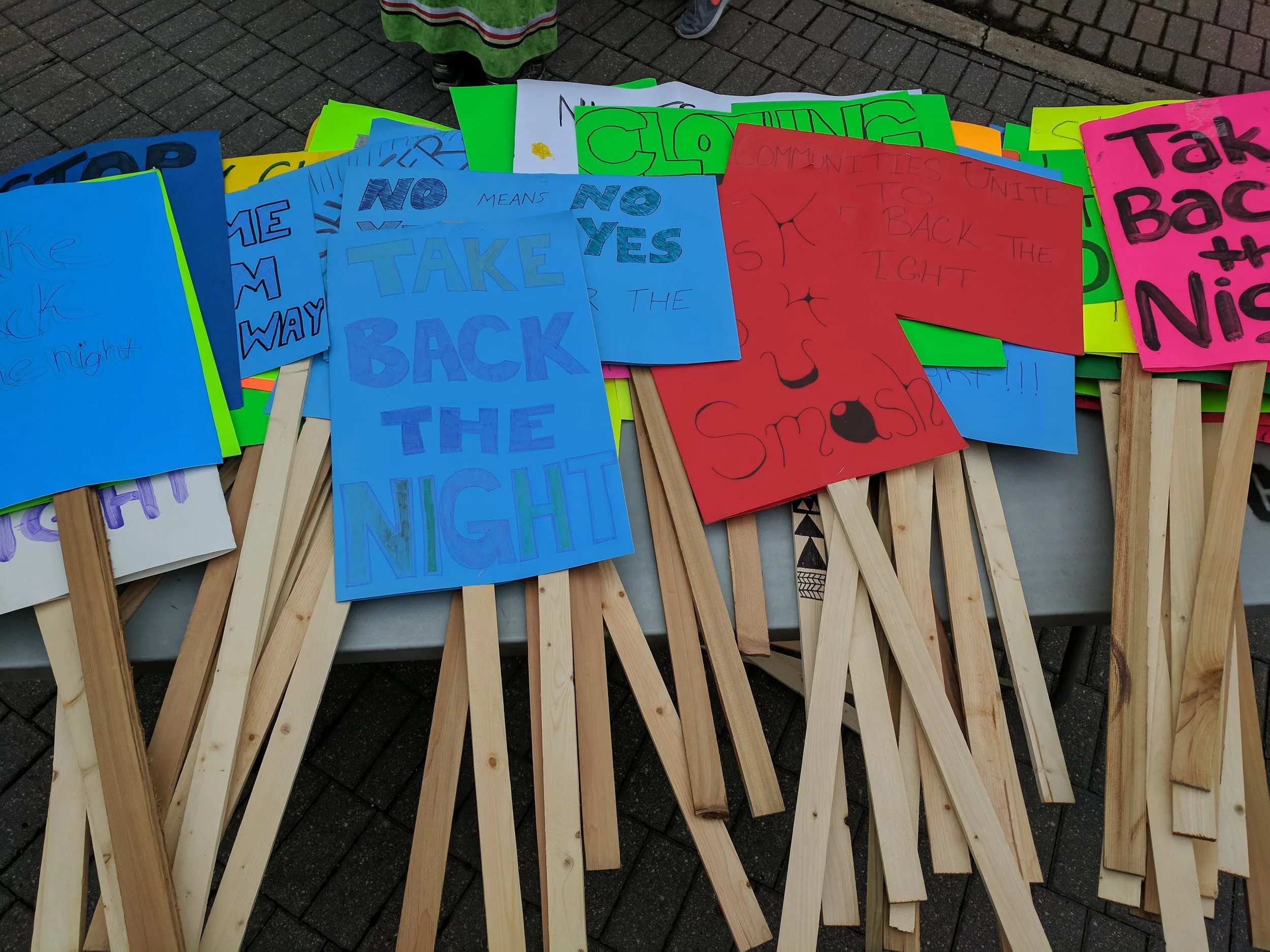 Signs from 2017's Take Back the Night. (Nick Brown/Brandon University Students' Union)
