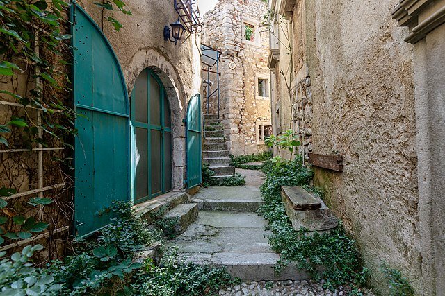 A tiny street in Plomin, Croatia, provides the "nooks and crannies" that help make communities feel safe. Wikimedia Commons