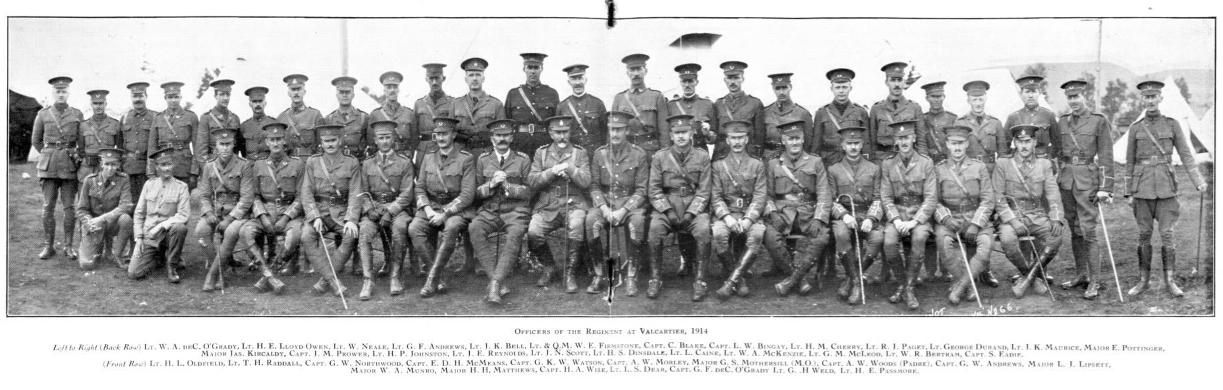 8th Battalion officers at Valcartier: Major Lipsett, the Battalion’s Commanding Officer, is seated, centre, where the page fold is; A. W. Woods is two to the left of him.