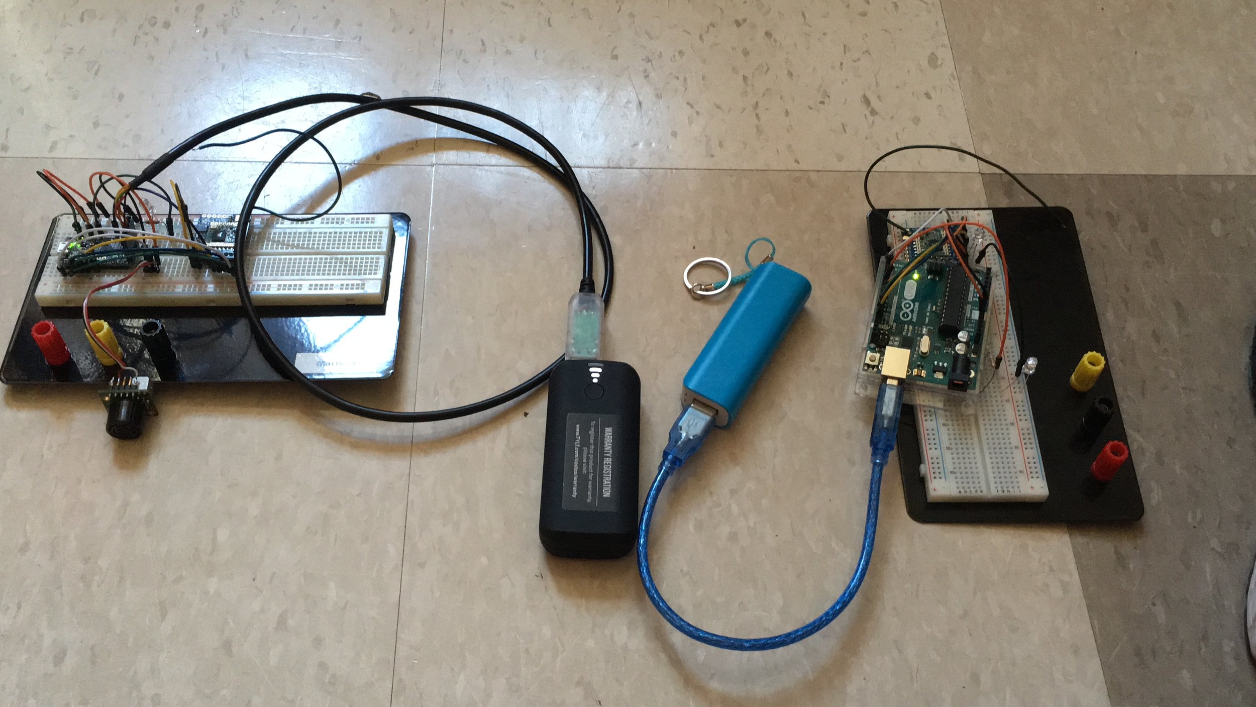 Update:&nbsp;Transmitter (left) and Receiver (right) on separate breadboards connected to portable 5V power sources