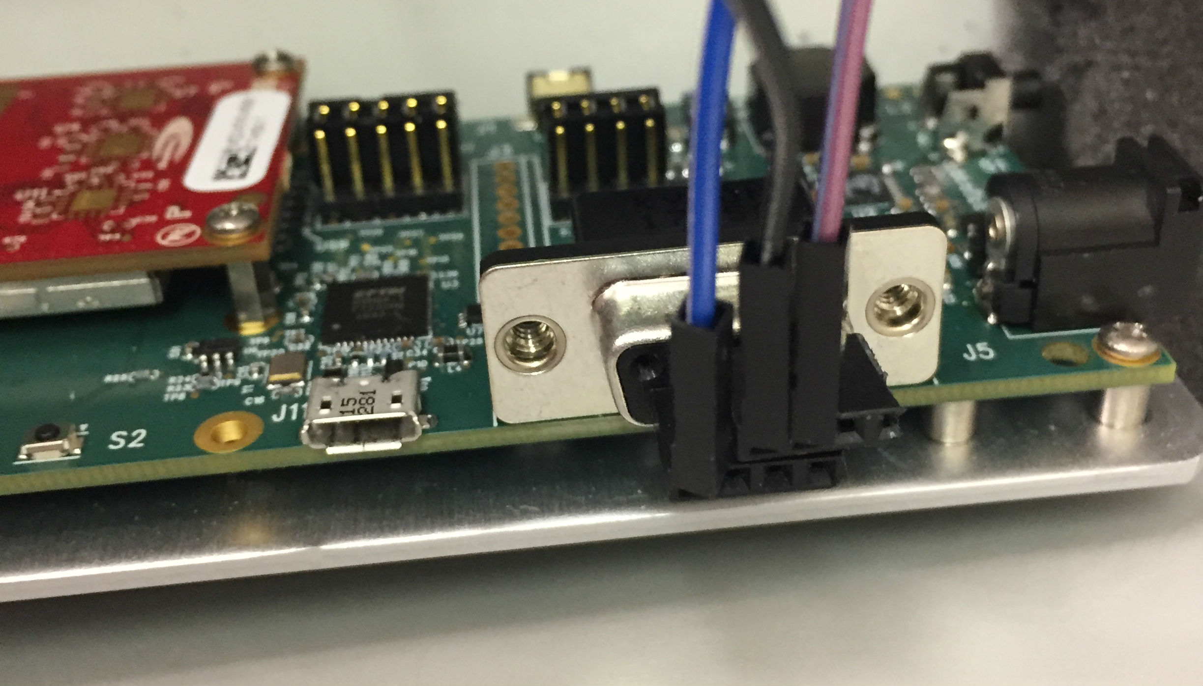 Female stacking row headers interfaced into D9 serial port