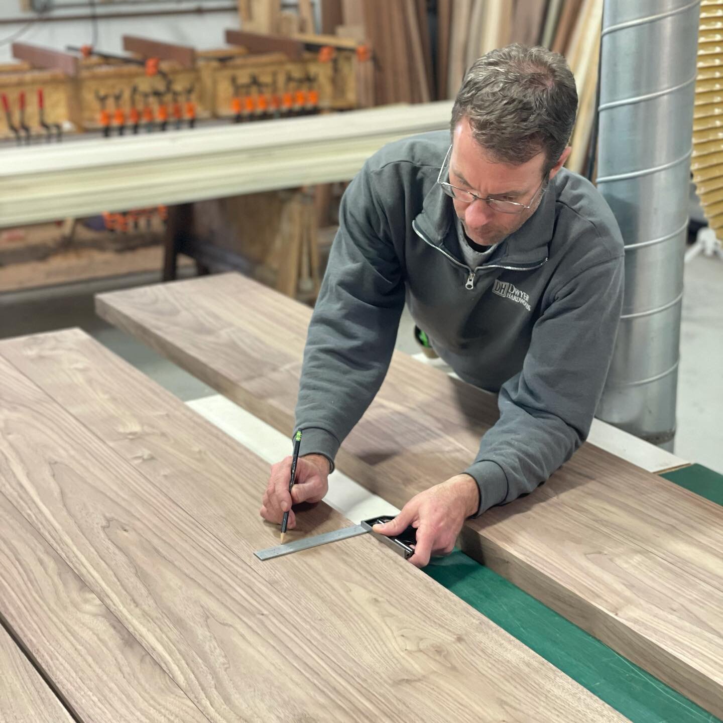 Laying out a large walnut top. #walnutwood #custommillwork