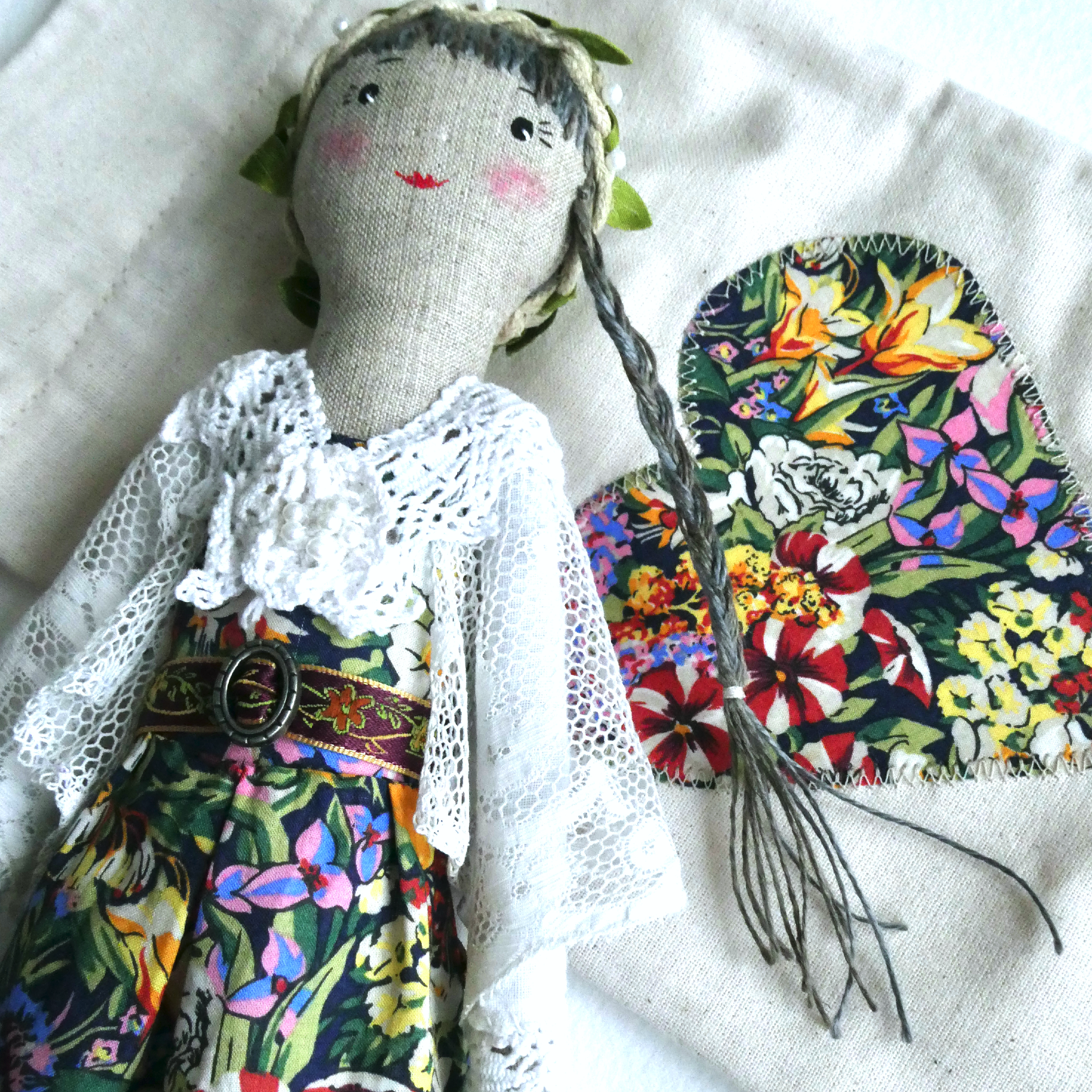 Rosalie and travel bag.png