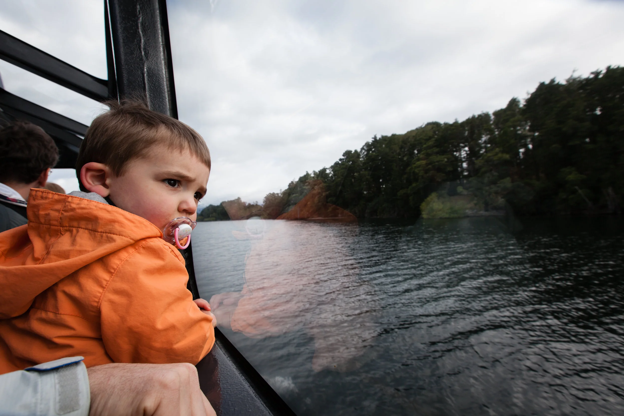 Heading out across Lake Manapouri on our way to Doubtful Sound. About that pacifier... anything that brings comfort to your kid, bring it and give it to them without restrictions. You want your kid to be able to soothe himself/herself whenever possible. Even if that means you have to get looks about your 2 year old still being attached to his pacifier. Rather that than the public meltdown! 