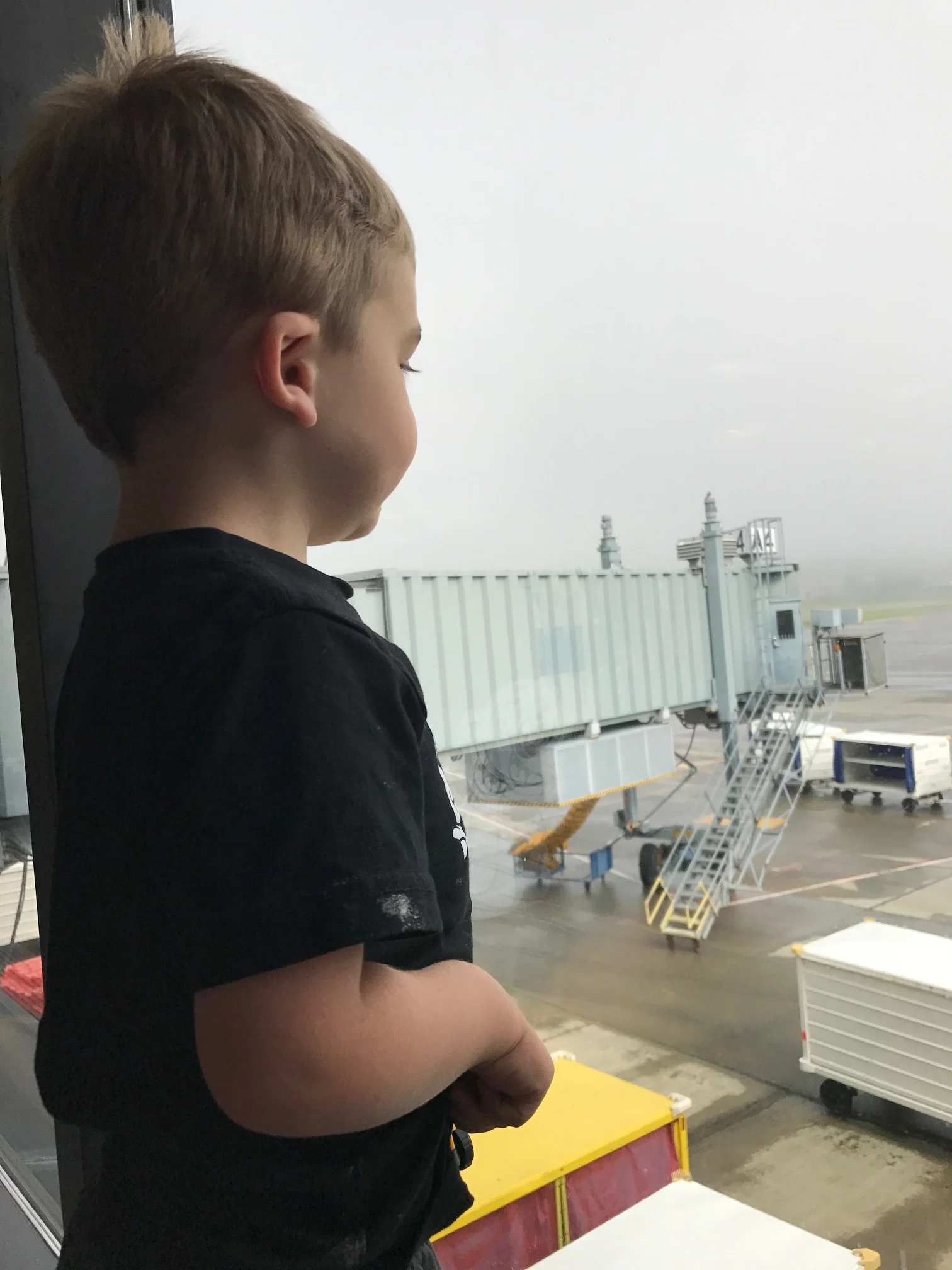 Checking out the planes at the airport. iPhone photo. 