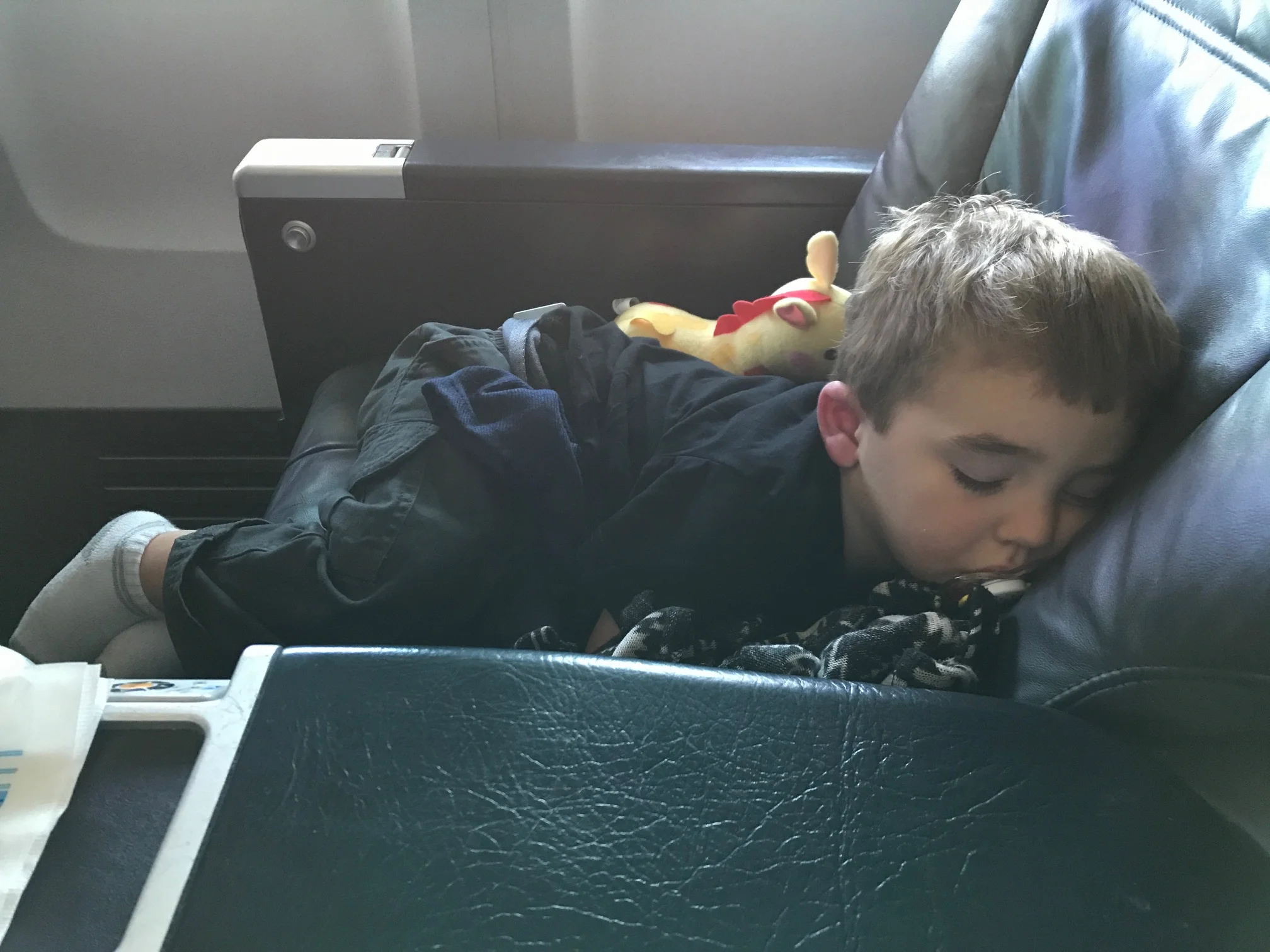 Nap time on flight number two. iPhone photo