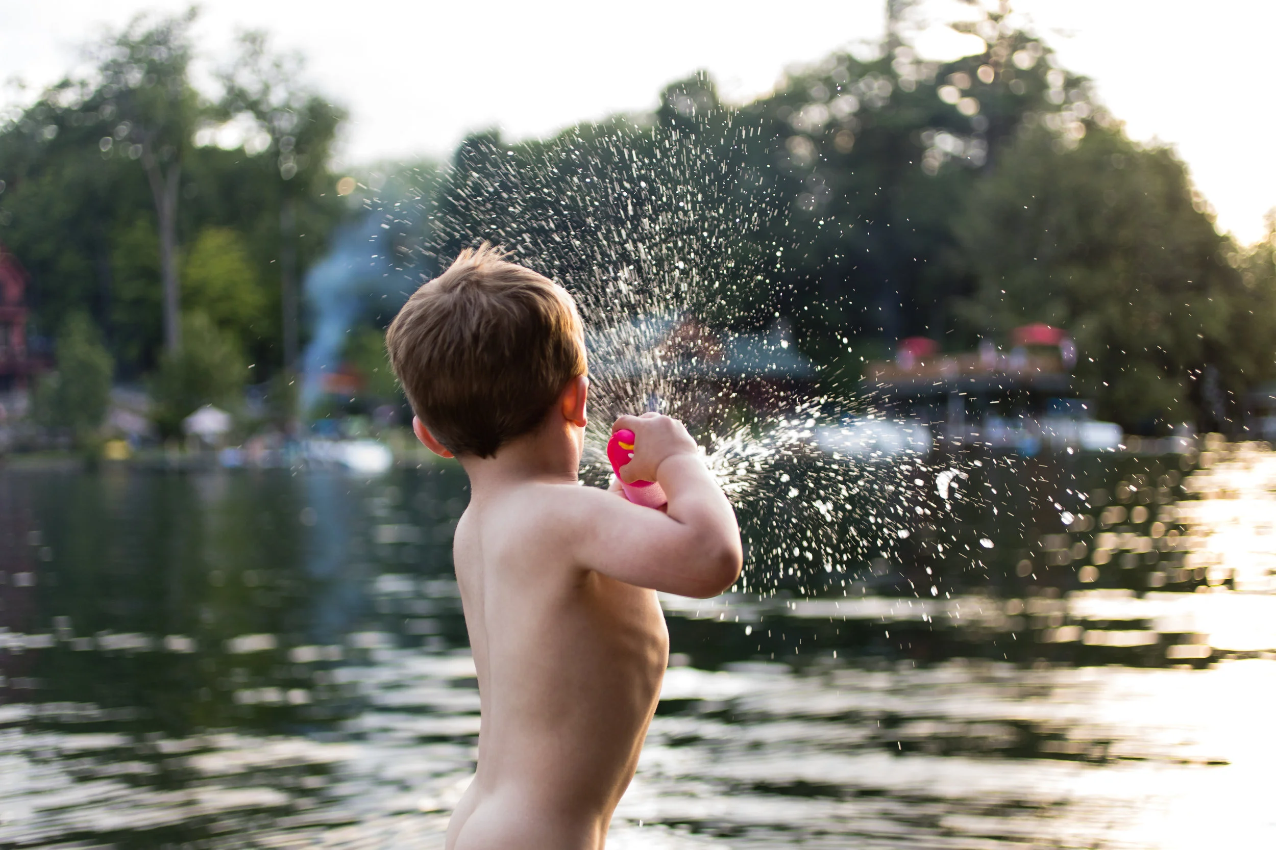 Playing naked on the dock at sunset with water guns. Best 4th of July ever! 