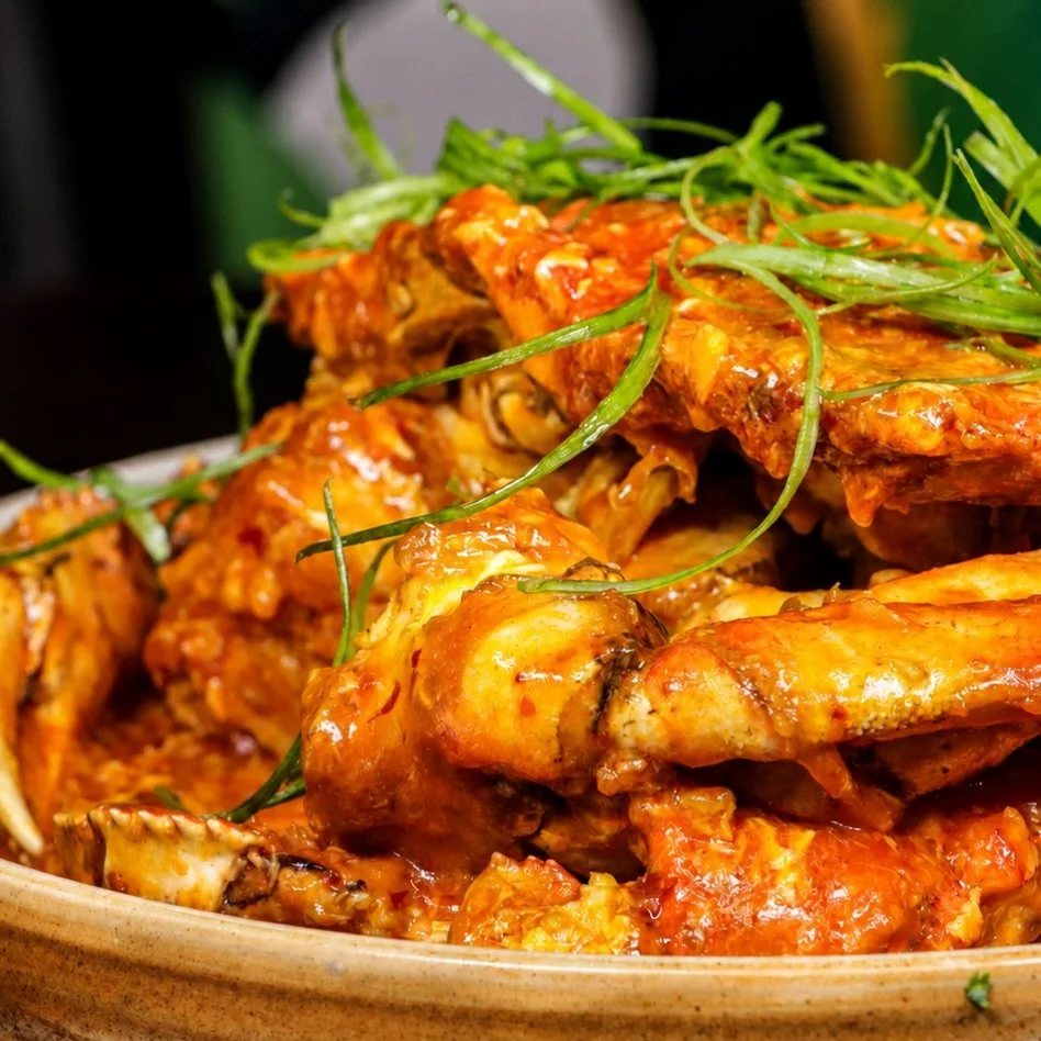 ✨ Some dishes are worth getting your hands dirty for. Our Singaporean Chili Crab features fresh Dungeness crab in a rich, sweet, and spicy chili sauce, served with warm mantou buns for the perfect finish. A Straits classic since 1987.
