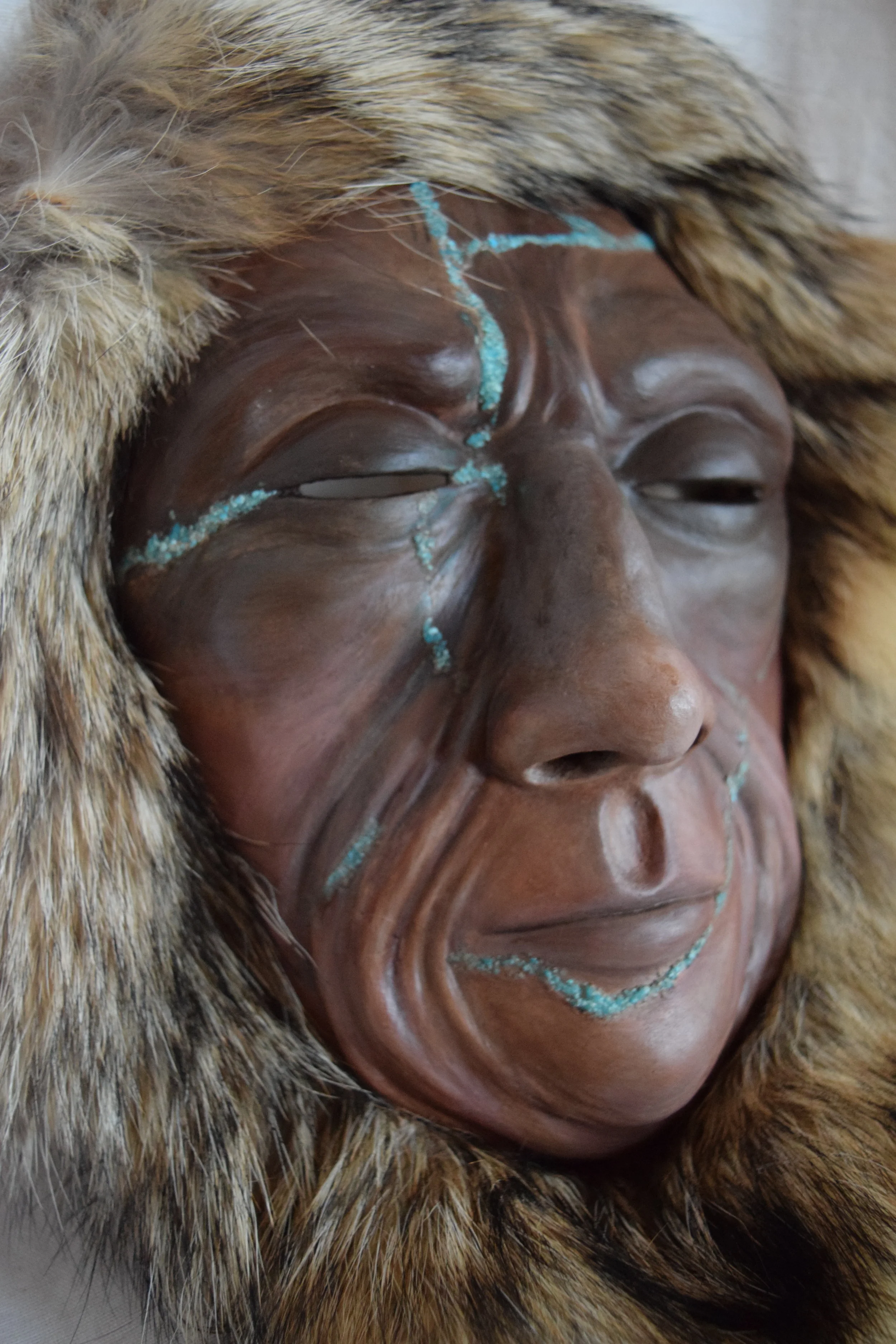 Great Blue, 2015. Clay, roadkill coyote hide, turquoise, acrylic