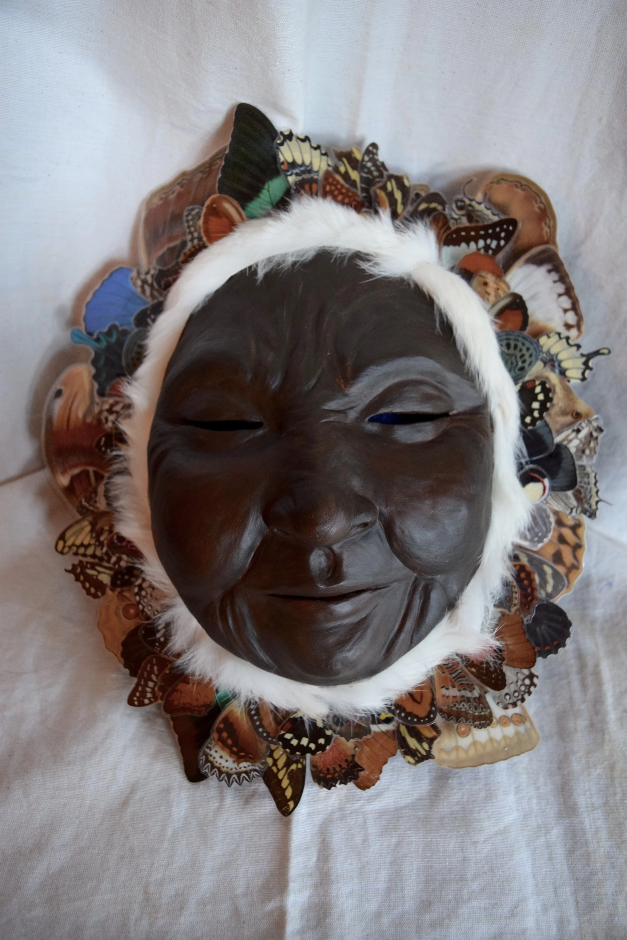 Butterfly Queen, 2015. Clay, rabbit hide, butterfly wings, acrylic