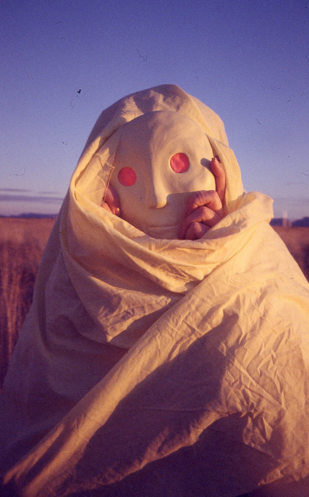  Ceramic mask, aerosol paint, rubber, dyed cotton fabric. 35mm Photo and Concept: Rachel Pozivenec. 2018 