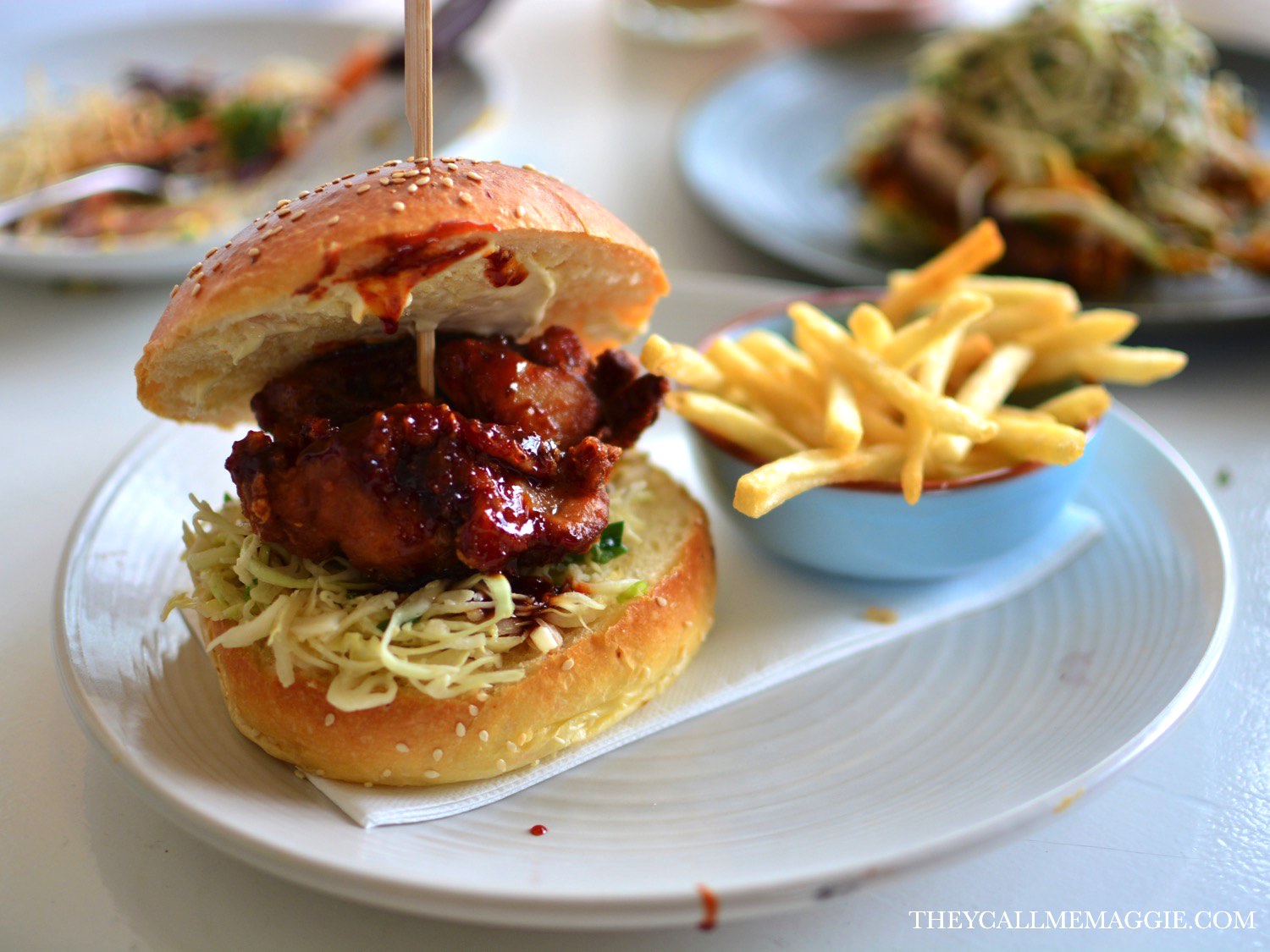  Korean fried chicken burger - with kimchi slaw, served with fries.&nbsp; 