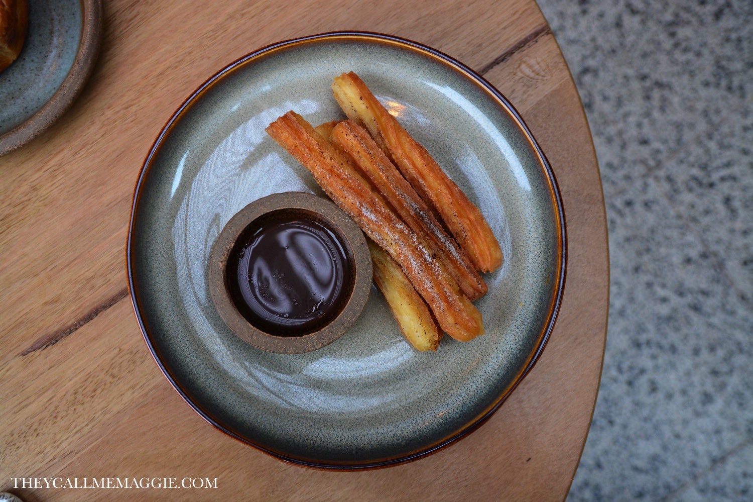 Nomada churros with coffee sugar & chocolate sauce.