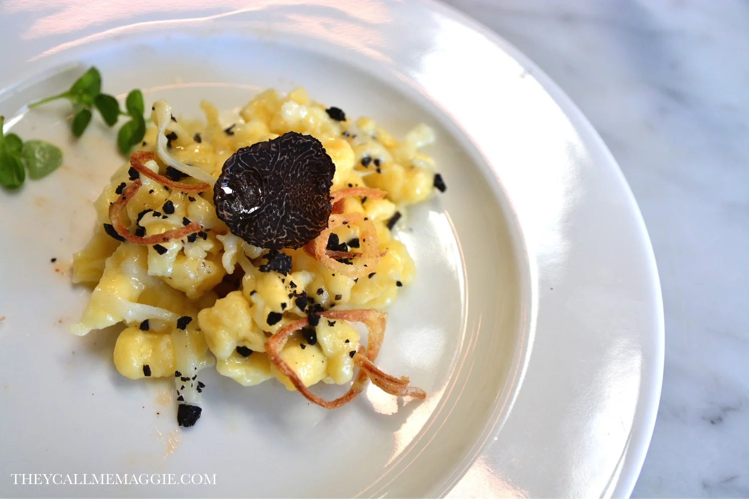 Truffle käsespätzle with crisp shallots. 