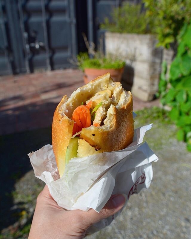 In the spirit of trying something new, not only did I venture from my usual banh mi haunt but also opted for tofu over mixed ham. 
This is To&rsquo;s Bakery tofu banh mi. I had my doubts when I bit into this one, purely based on looks (pale cubes of 