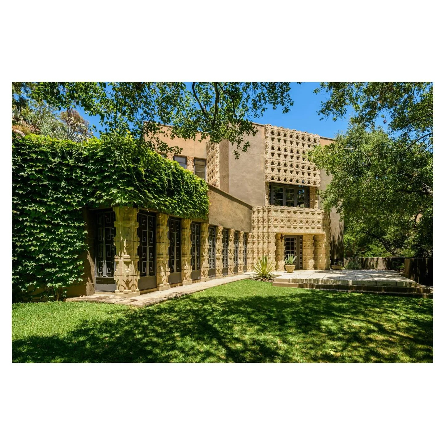 It was a pleasure some months ago to photograph Derby House designed by Lloyd Wright, the son of Frank Lloyd Wright. The interior of the house was undergoing extensive renovation. However, the pre-cast Mayan block exterior, along with yucca plant ins