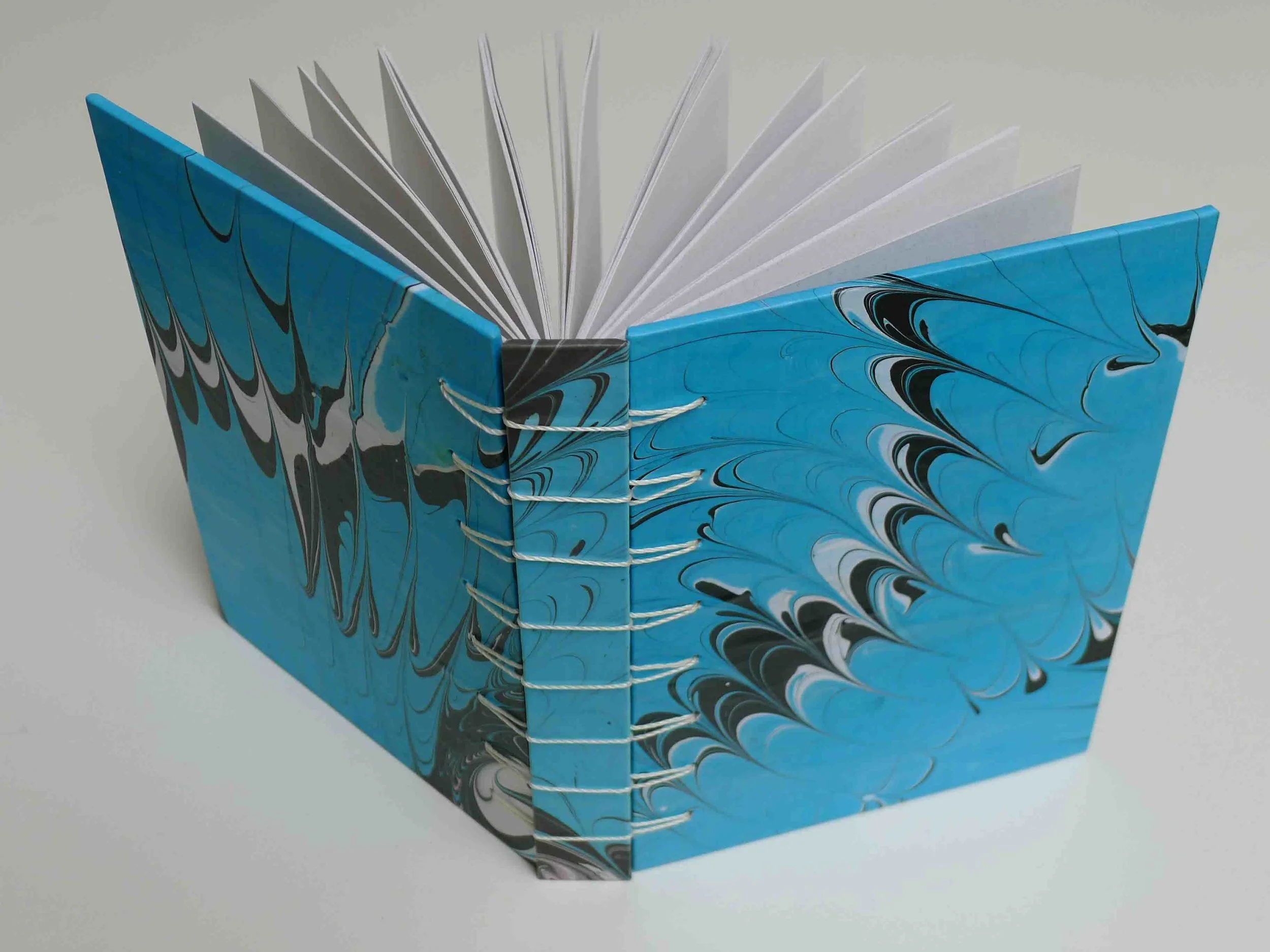 secret belgian with hard cover, paper covering