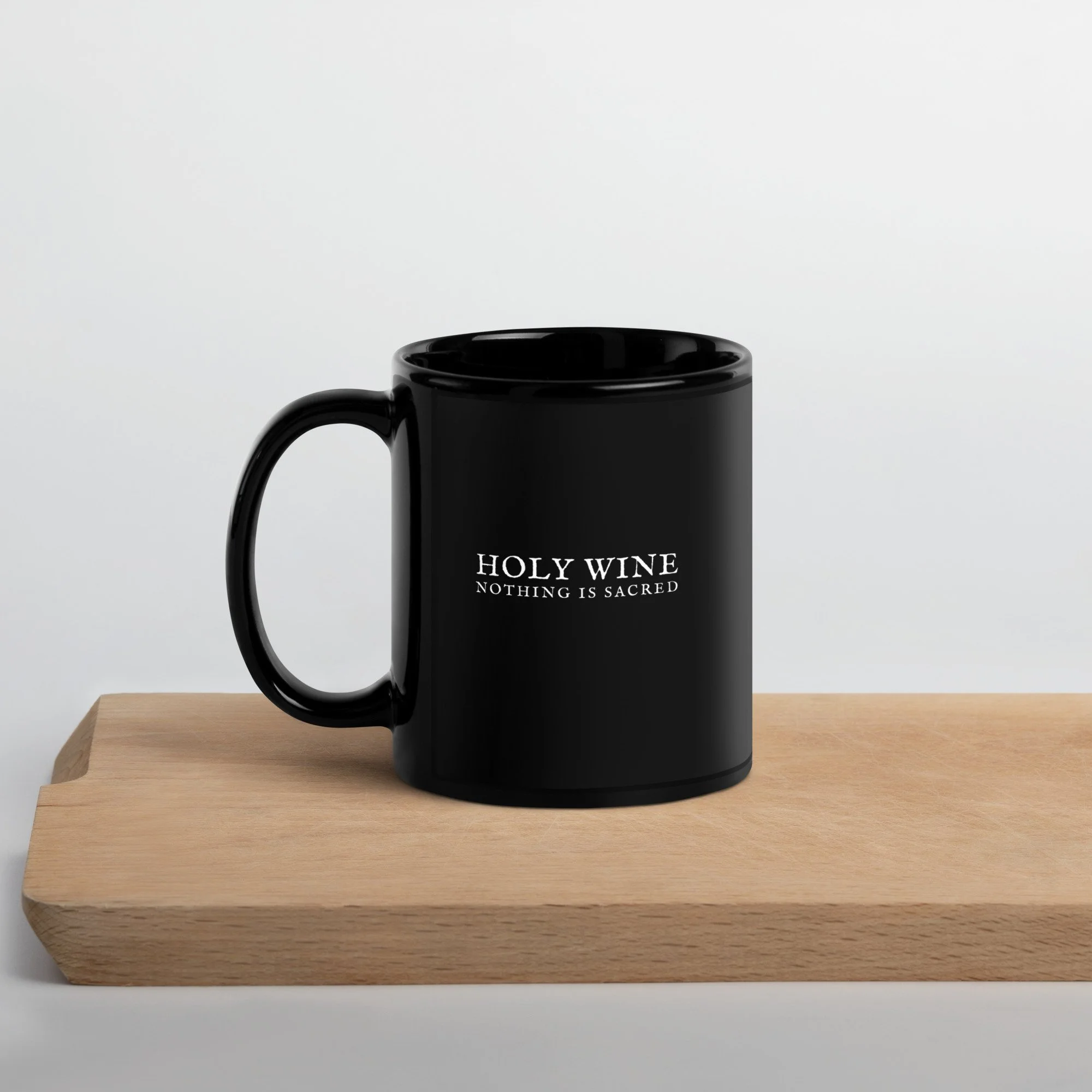 black-glossy-mug-black-11-oz-handle-on-left-66e7fbd55d277.jpg