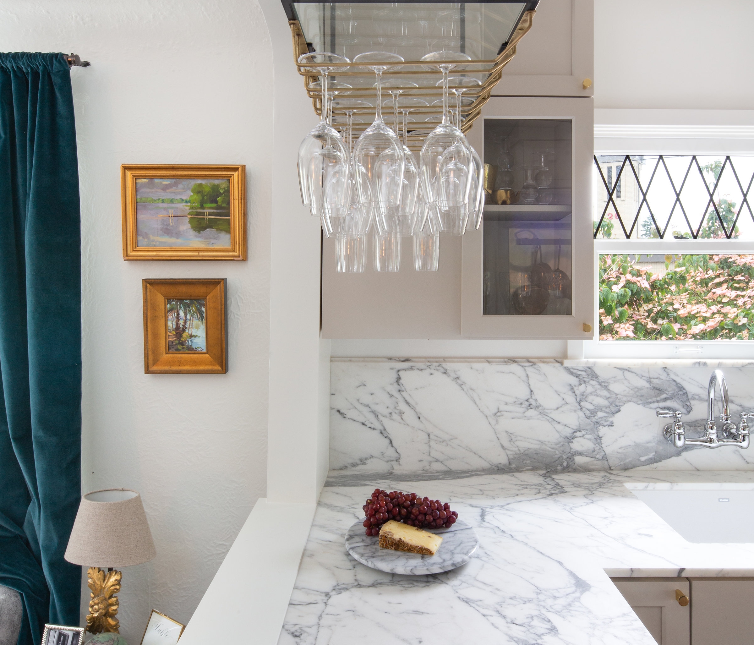 DistinctiveKitchensCustomwinerackmarblecountersandbacksplash.jpg