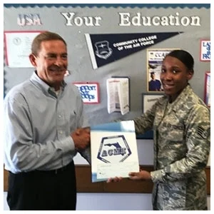 Keith Davis, Florida ACME Vice President, presenting a scholarship to SSgt Alicia Hunt, 2016 Active Duty recipient.