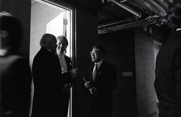 Conductors James Fankhauser (left) and Jesse Read (centre) meet with Chan Centre architect Bing Thom backstage at the inaugural concert. Photo: Daryl Kahn Cline