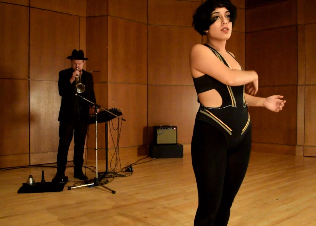 Kiran Bhumber demonstrates her Responsive User Body Suit. Photo courtesy of Kiran Bhumber