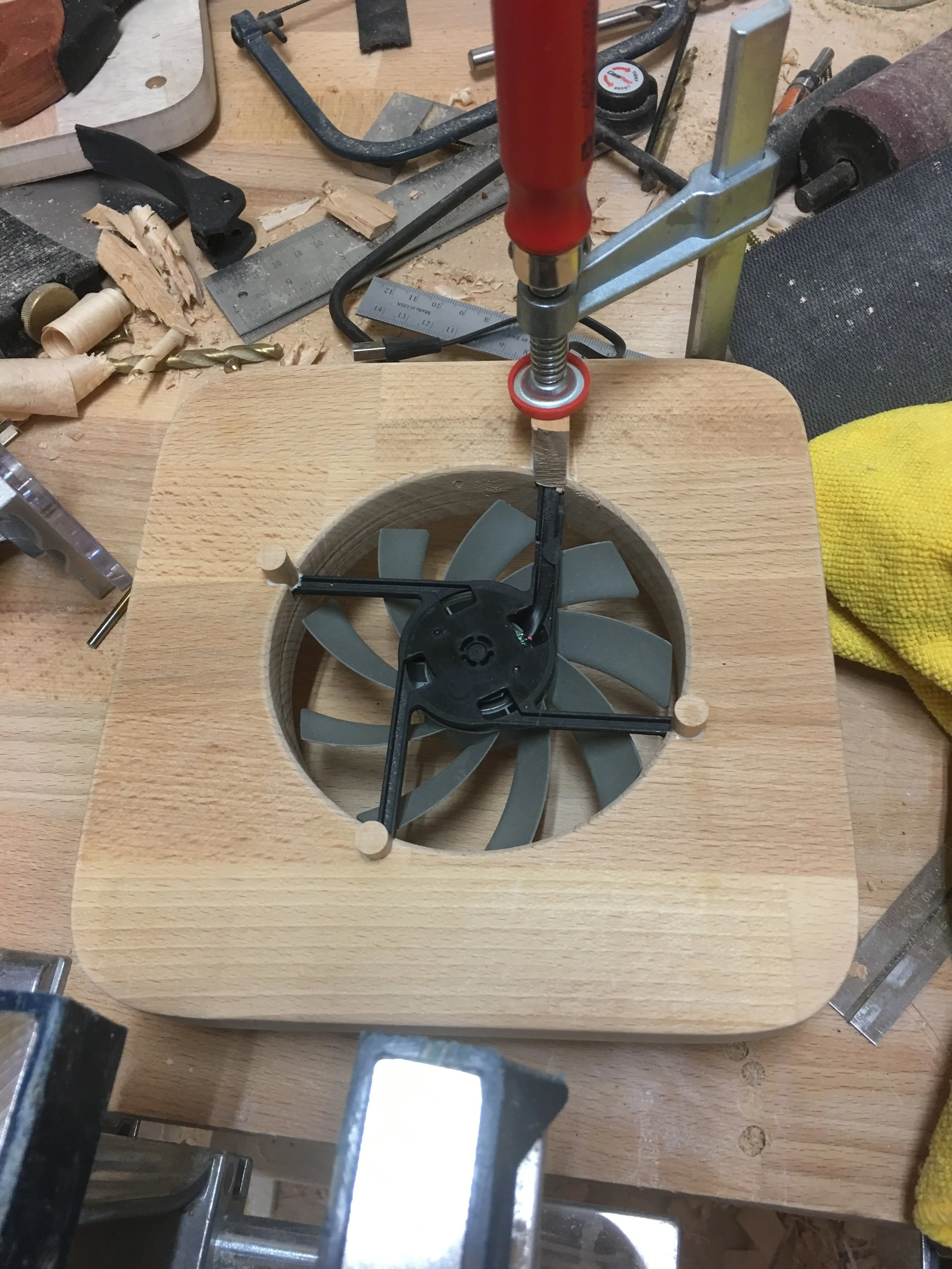 Gluing the plugs in.