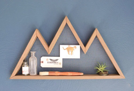 Unique baby shower gift of mountain shaped wall shelf from etsy.