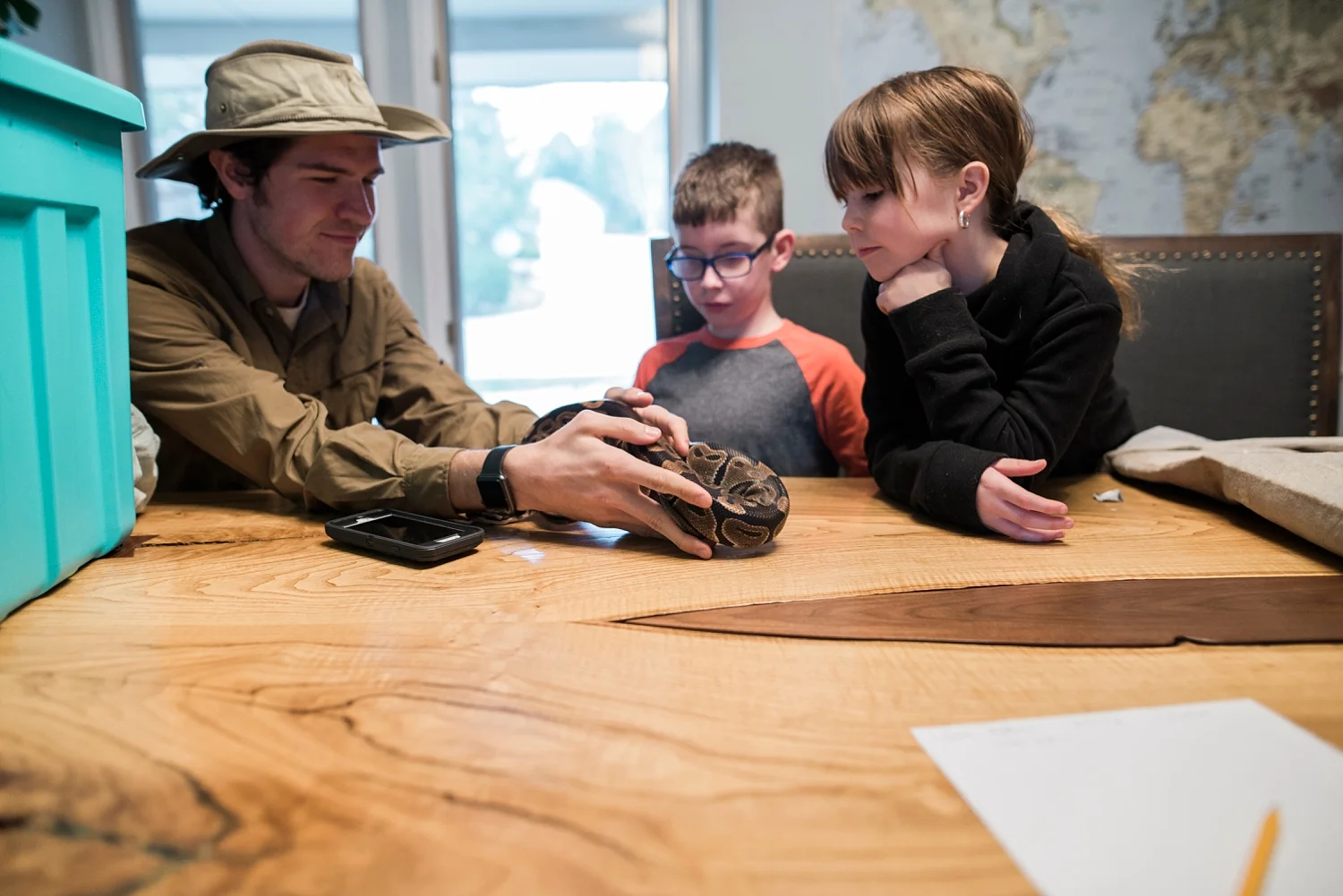 kids-hold-snake-during-in-home-reptile-class-denver-getting-unschooled.jpg