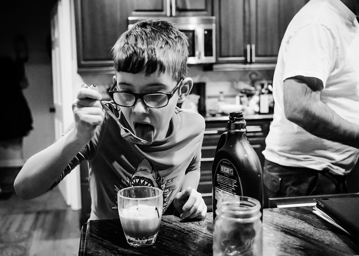 Townes is making homemade chocolate milk after swim lessons on the Week in the Life of an Unschooler #2. | GettingUnschooled.com | #unschool #homeschool #deschool