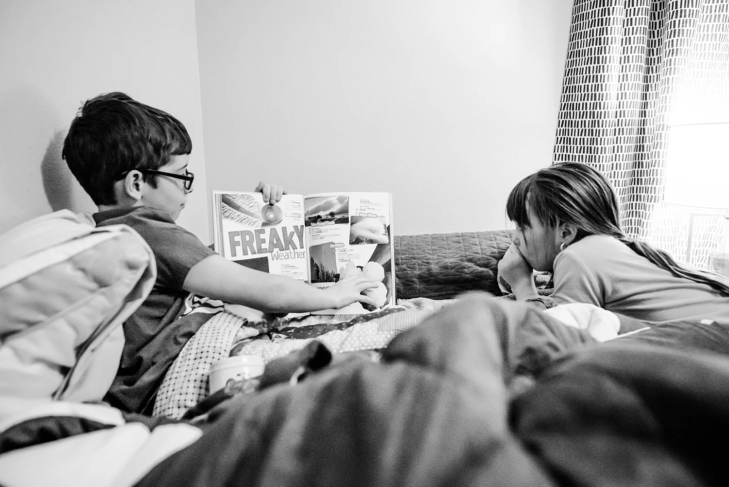 Townes points out something freaky from his book before bed. | GettingUnschooled.com