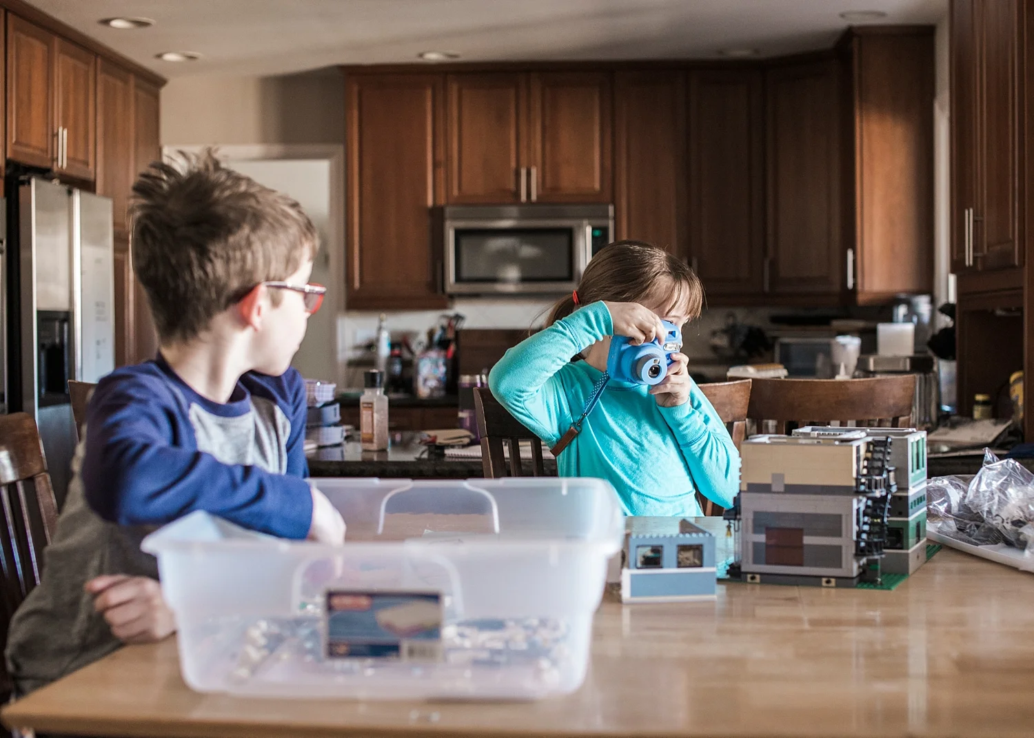 Kate is loving her Fuji Instax camera--I loved catching her taking this shot! More of what our typical days look like as unschoolers on Getting Unschooled :) 