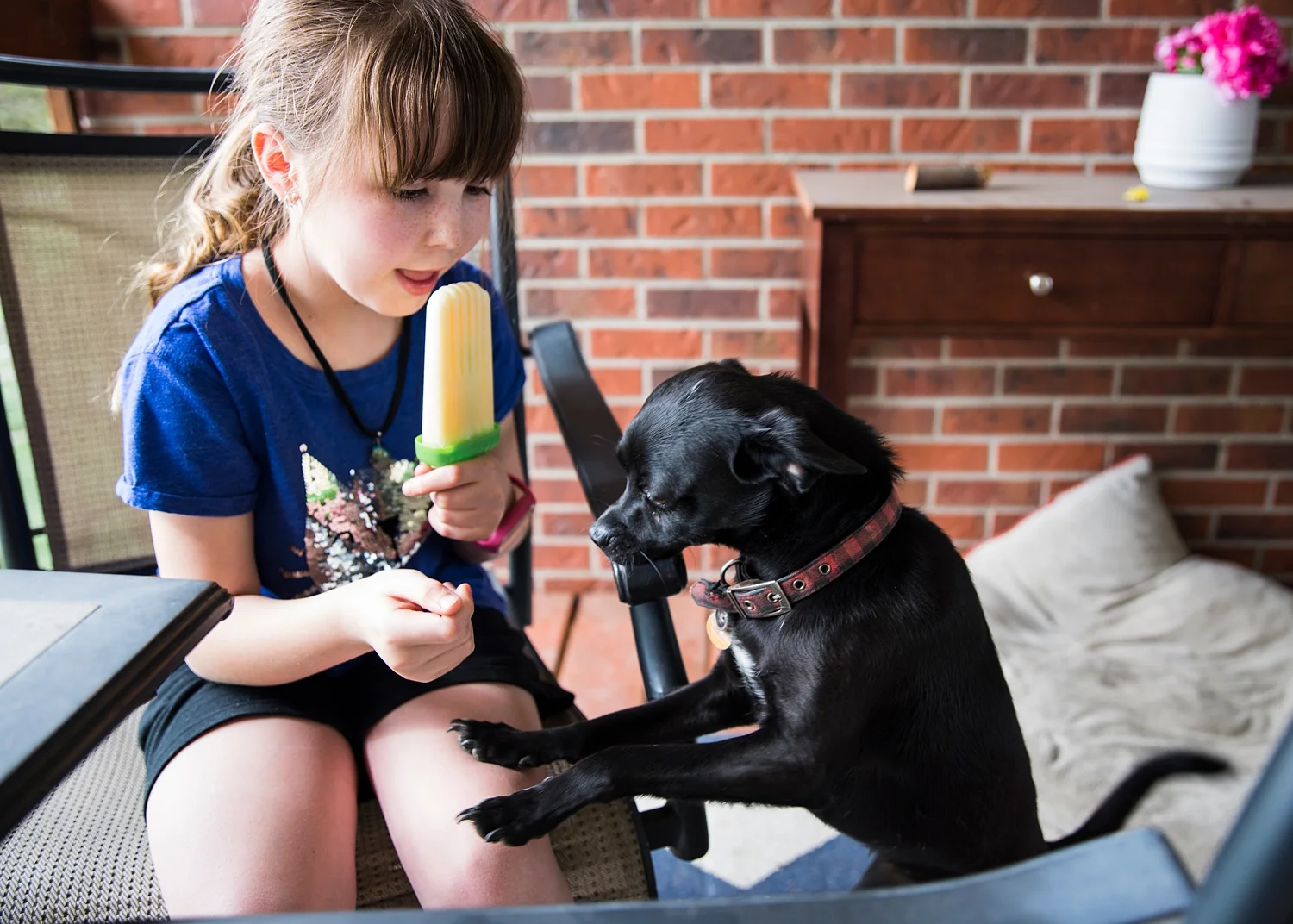 Keeping the dogs away from her homemade creamsicles is part of the job. Why homeschooling is good is something we try to show in our Week in the Life of an Unschooler series :) 