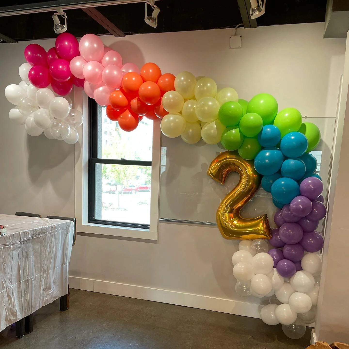 Rainbow fun for this 2 year old! 🌈 #tiedwithabowballoonco