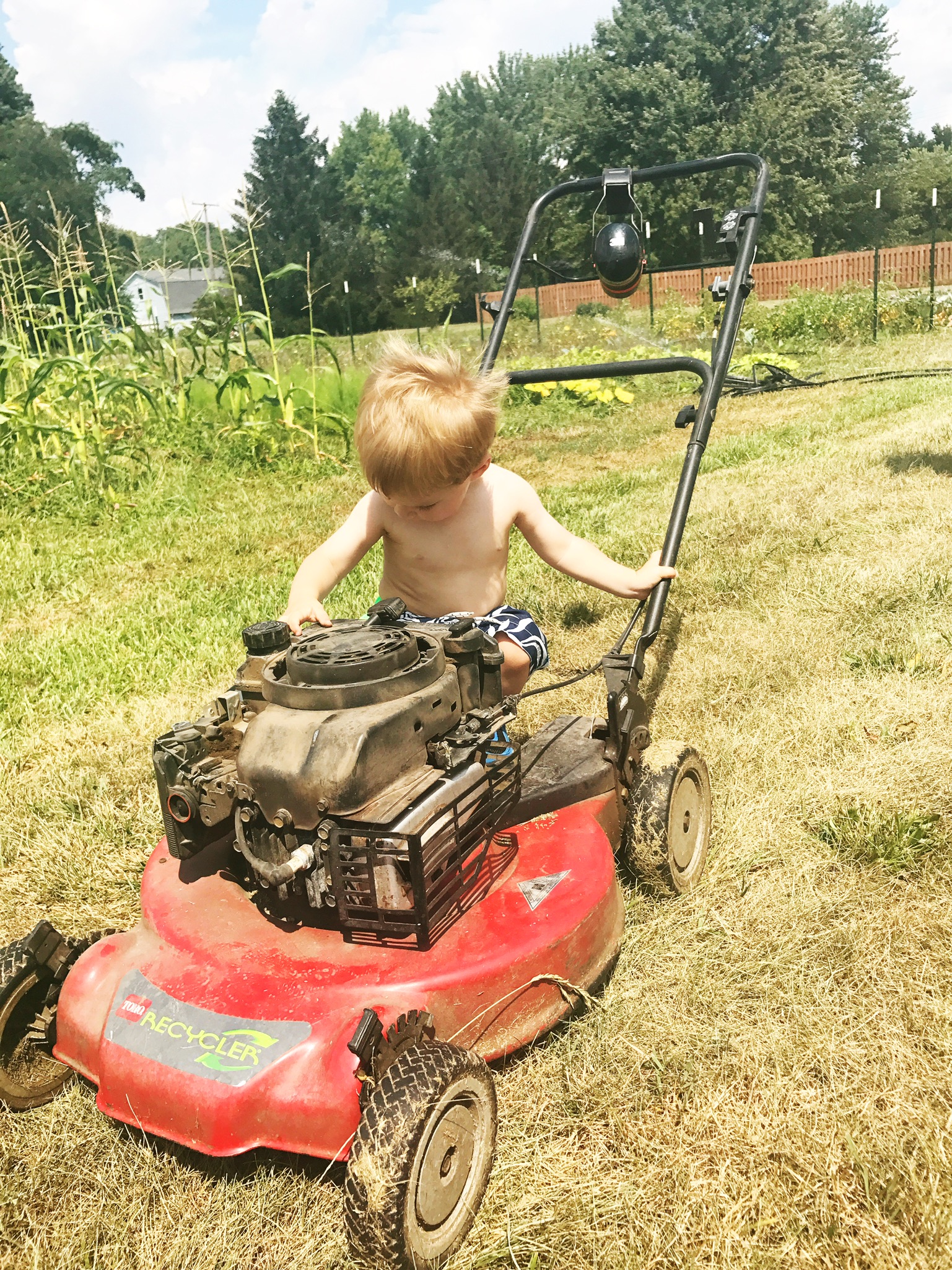 Our mechanic checking to make sure all the farm tools are running properly. 