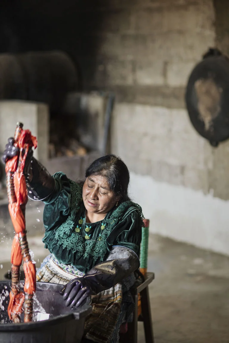 Photo taken from Elle photo caption-Dip-dyed bags from Guatemala