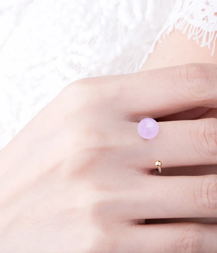 rosequartzgalaxyringonhand.jpg