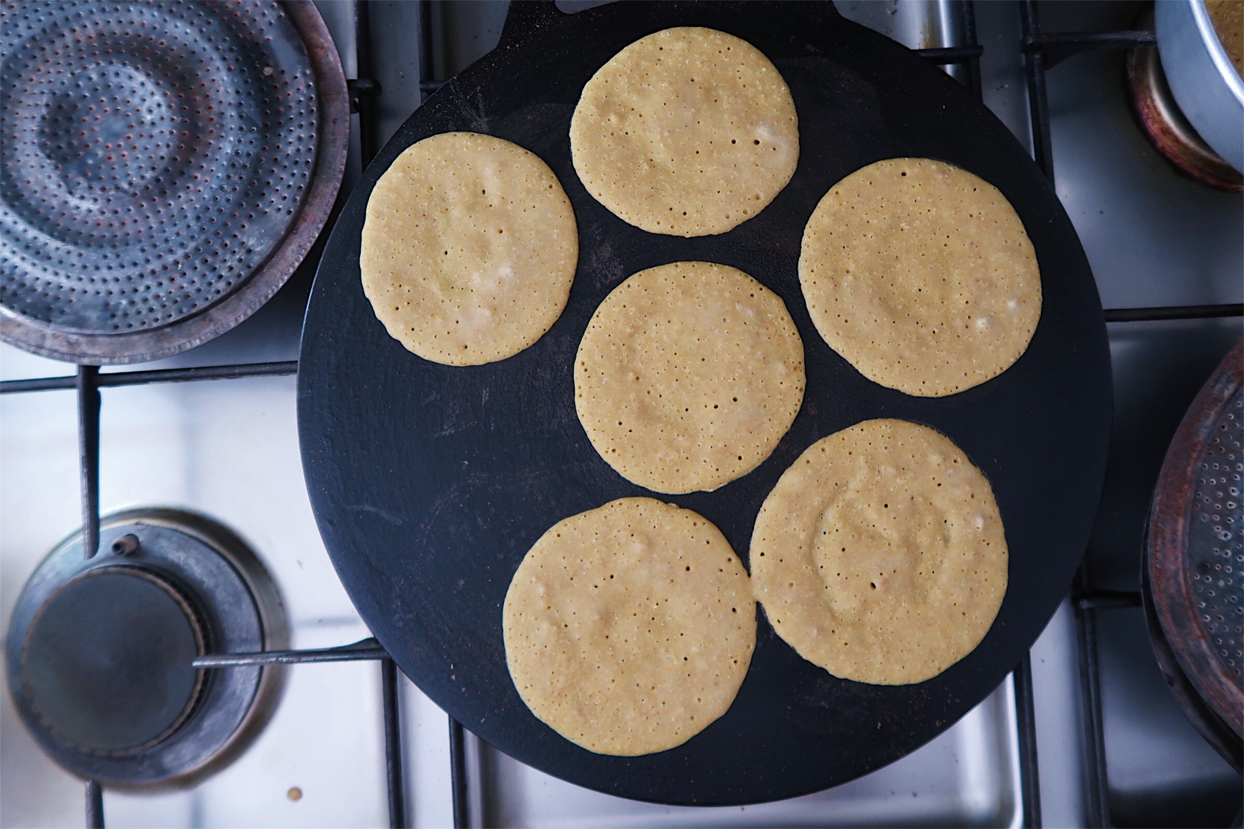 Flip them over when all the white areas have been browned.