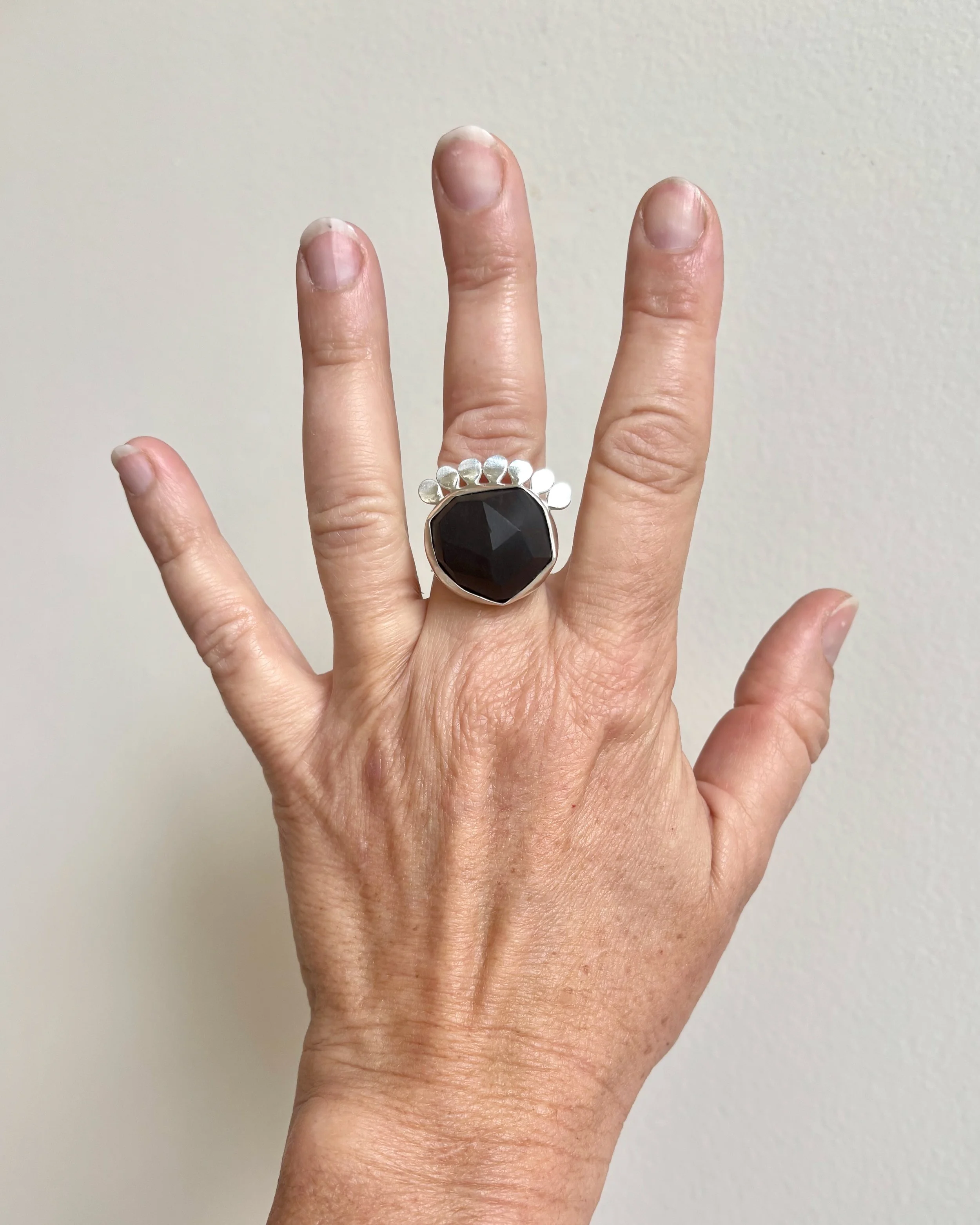 FacetedEbonyDetailRing - 1.jpeg