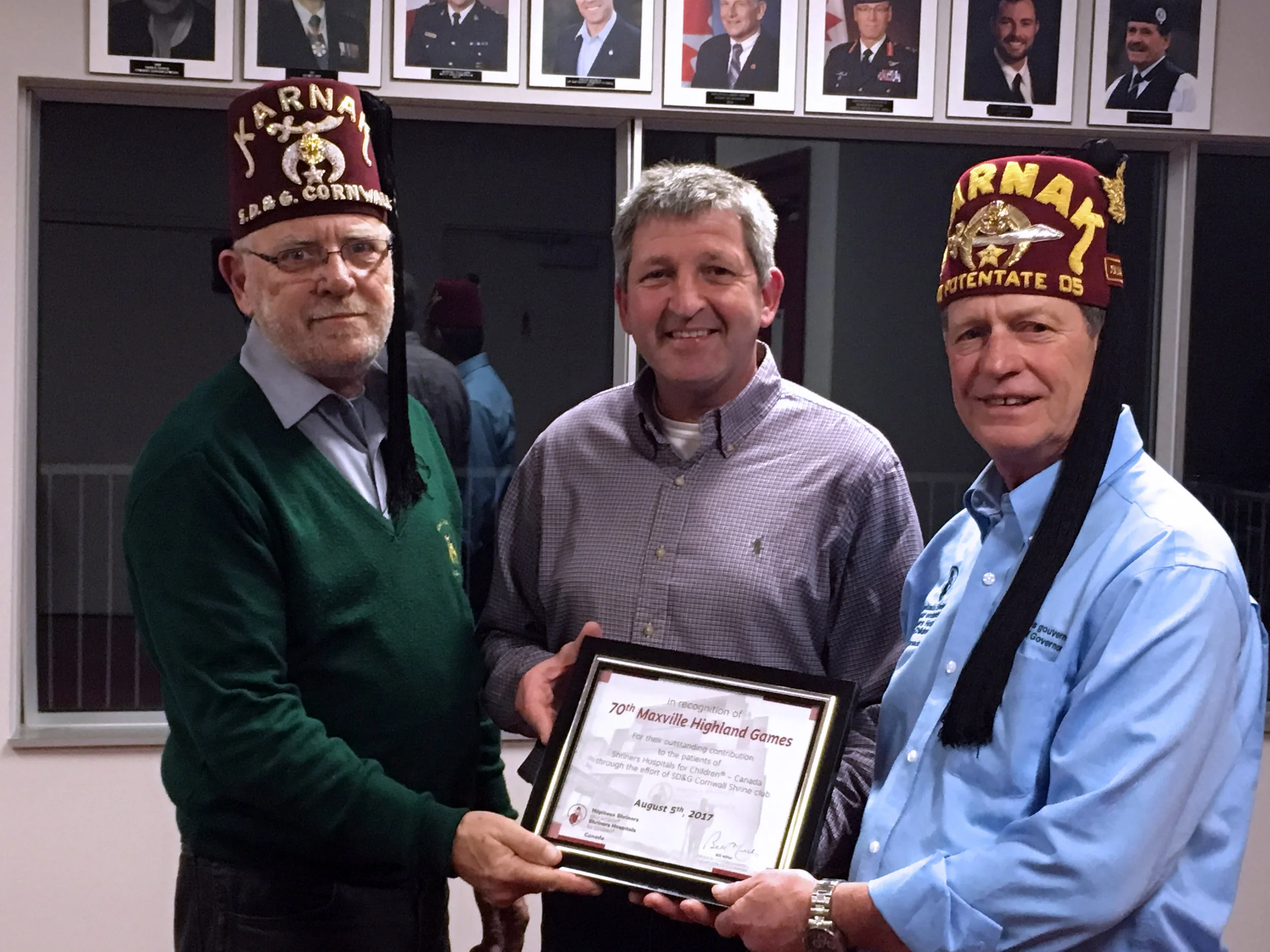 Jim Moak (left), Games President Lindsay MacCulloch (centre), Rory MacLennan (right)